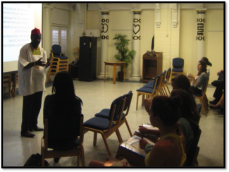 Speaker and Attendees photograph at a past Apero Brown Bag Lecture