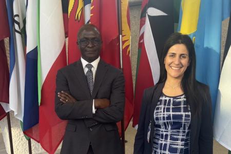 CenHTRO Director David Okech and Associate Director Lydia Aletraris photographed at the International Labour Organization headquarters at the United Nations in Geneva, Switzerland